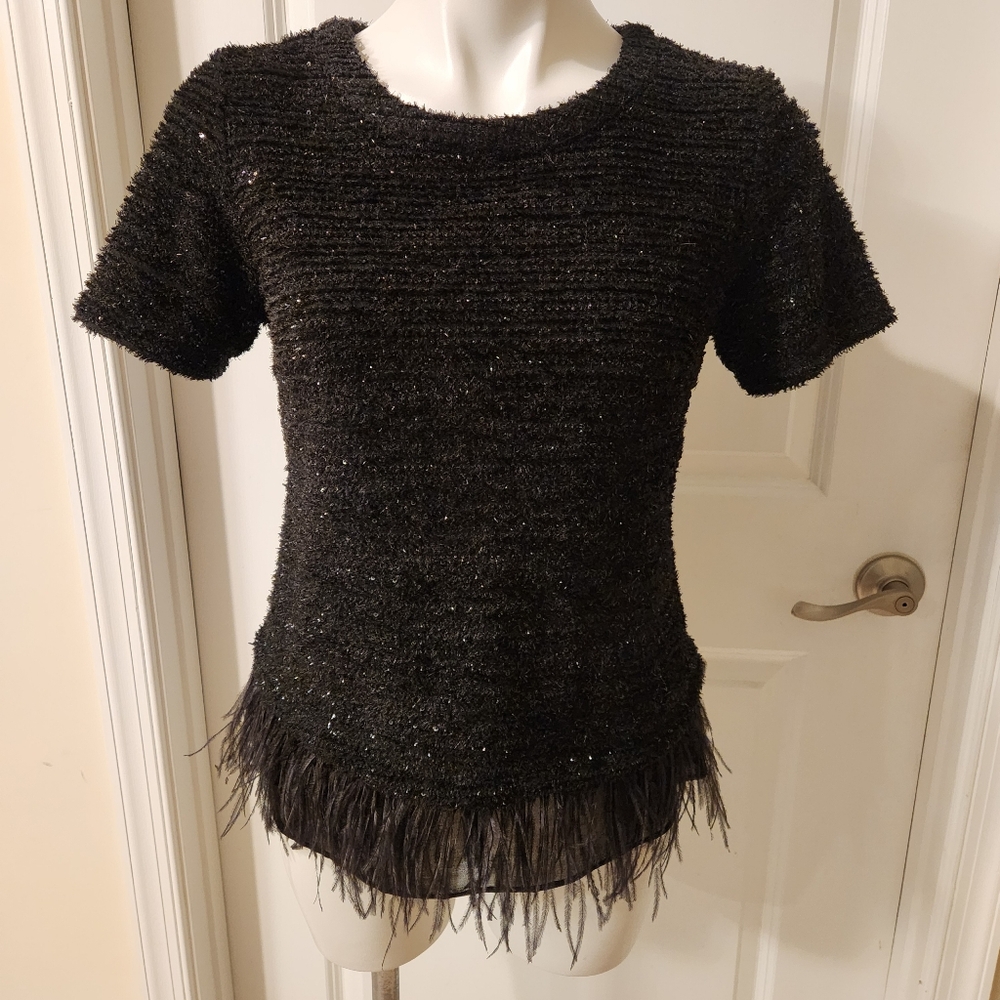Deletta Anthropologie Small black blouse with feathers on the bottom